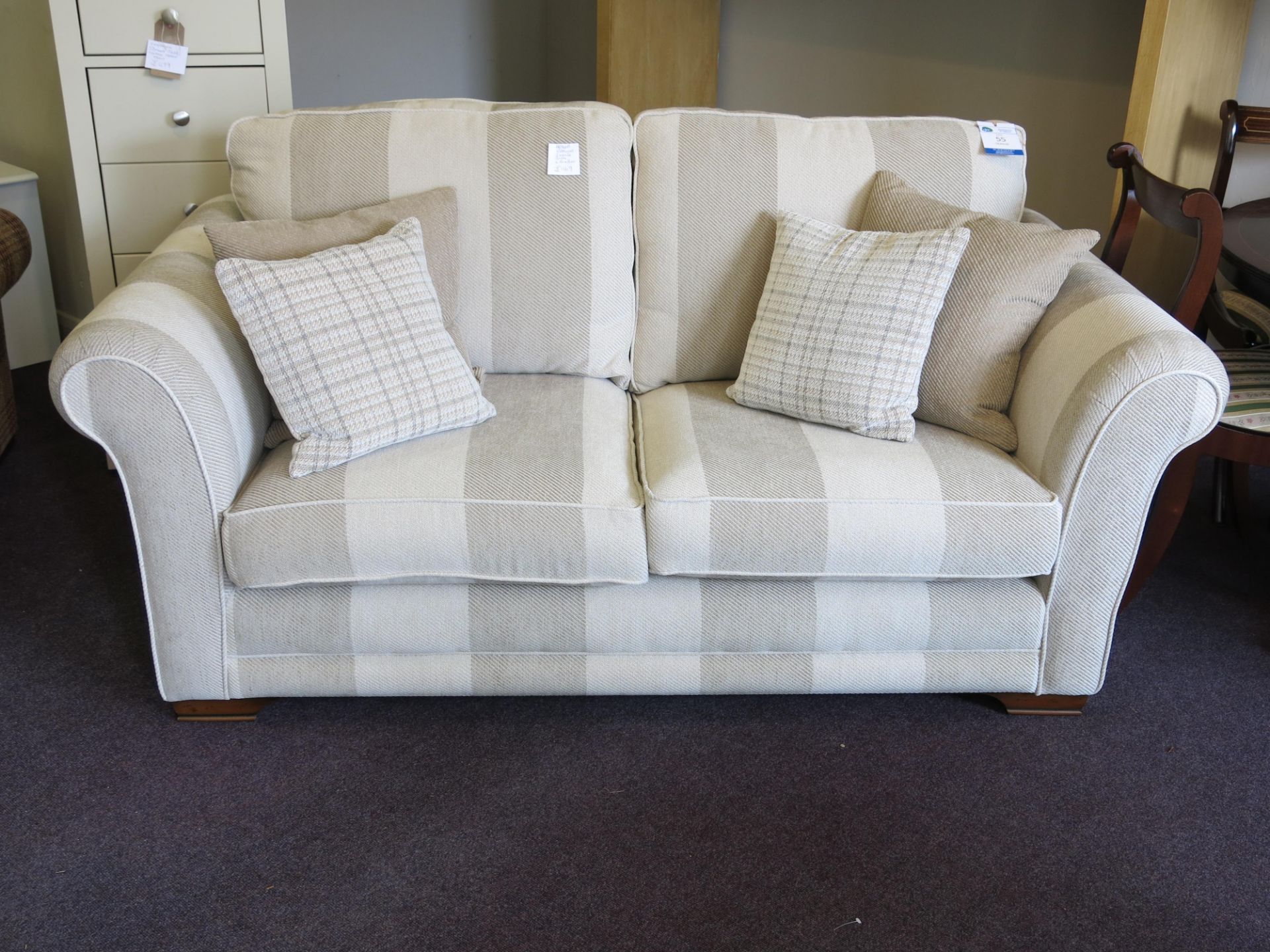 Alstons Vermont two seat sofa with four scatter cushions. The sofa is covered with natural tweed