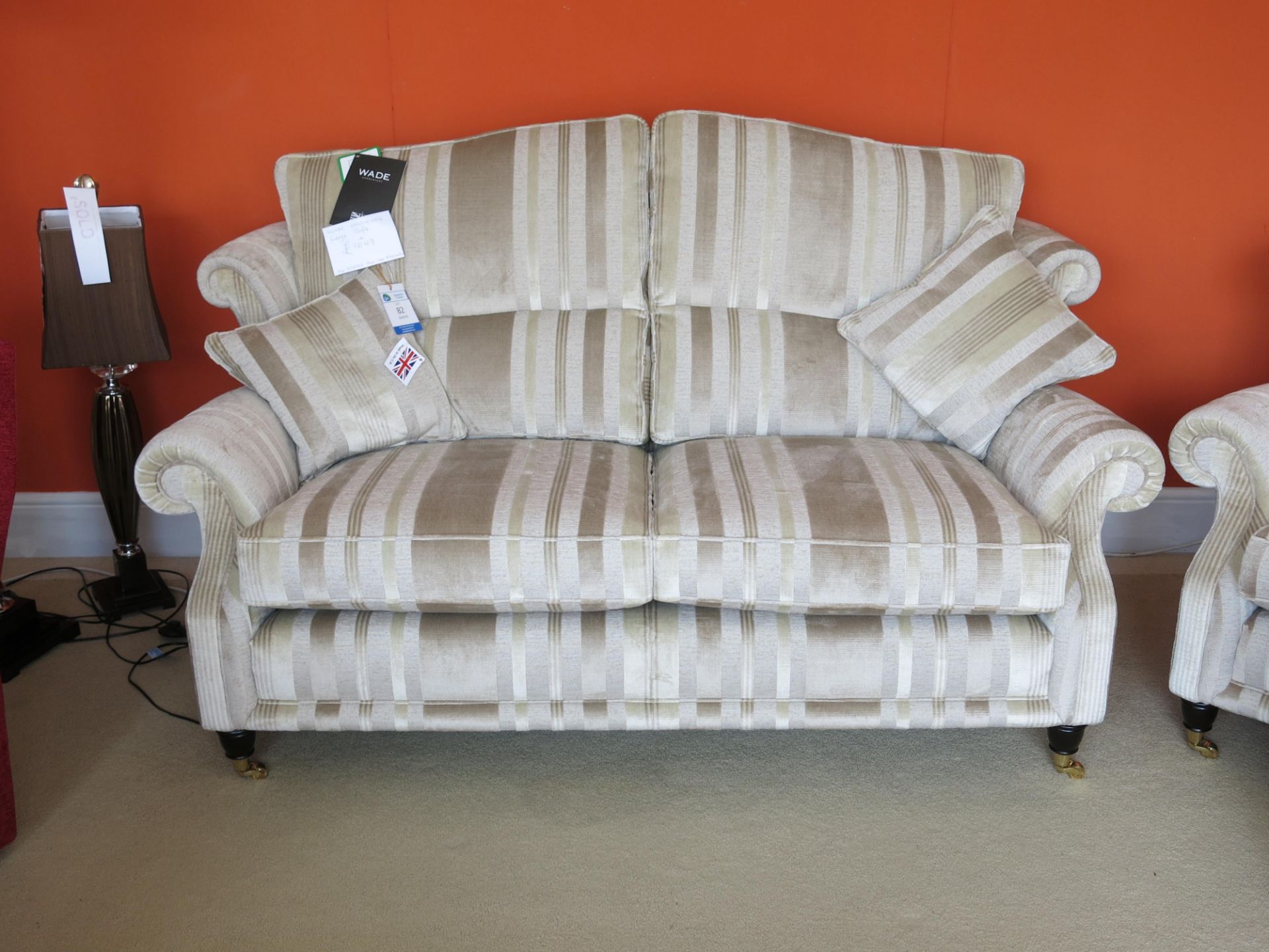 Wade Hollinwell large sofa with two matching scatter cushions with mahogany legs, the front legs