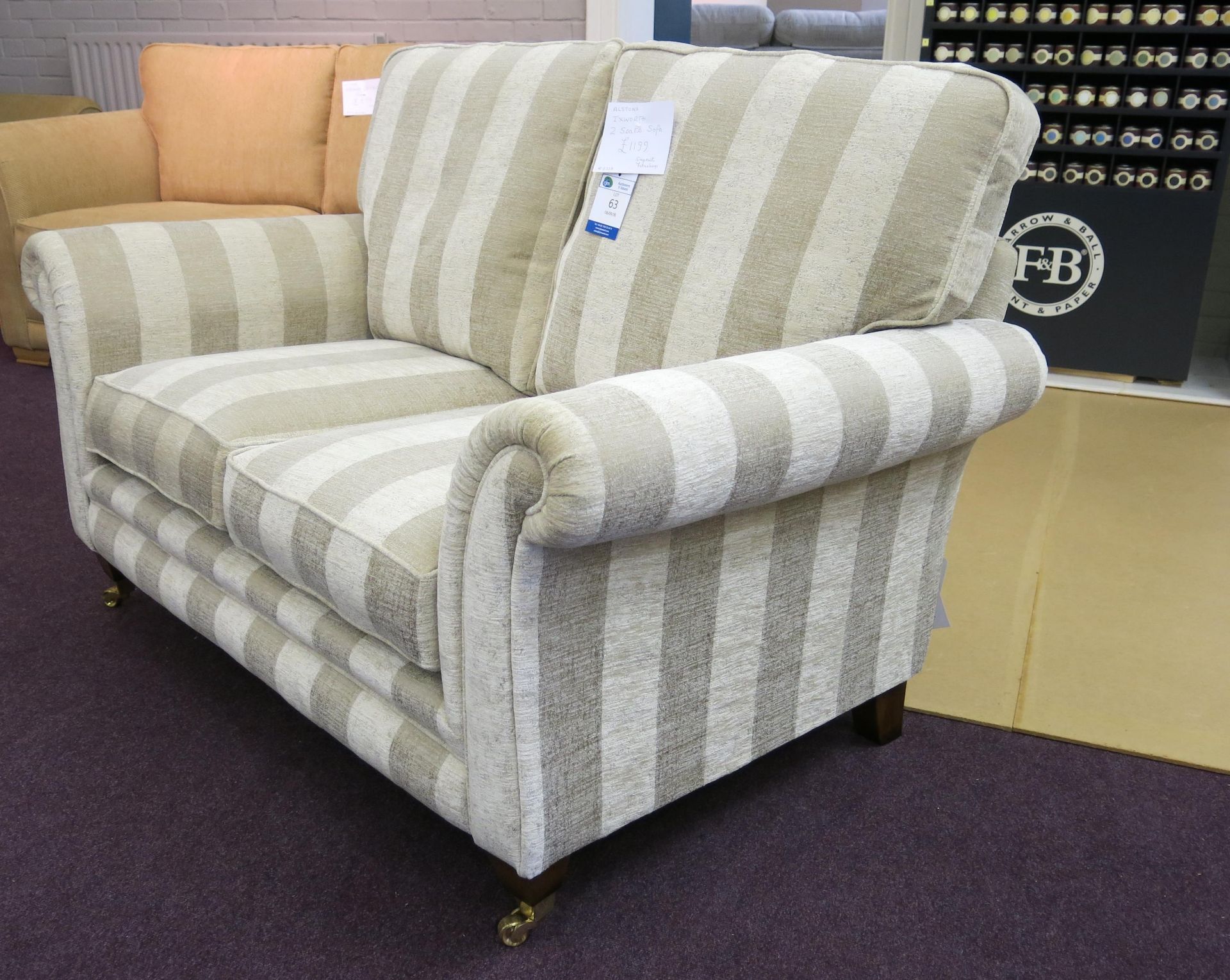 Alstons Ixworth two seat sofa with oyster stripe cover with polished brass castors on front feet. - Image 3 of 4