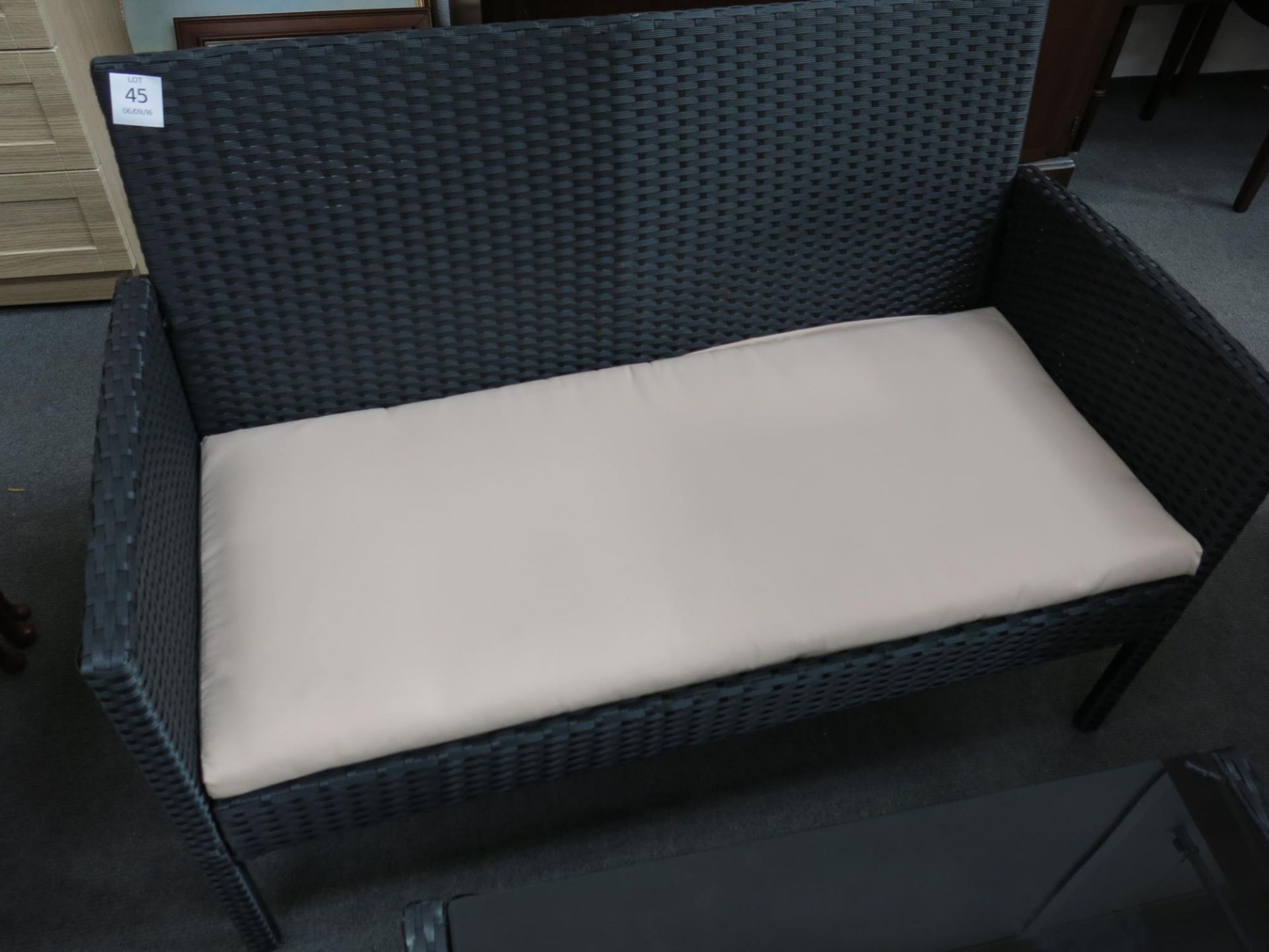 * A four piece set of all weather furniture to include; a two seat sofa, two single seat chairs