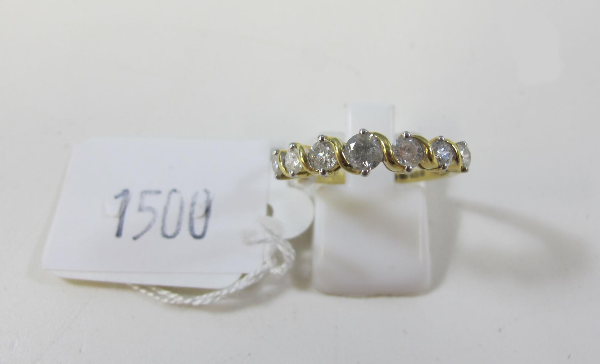 Ladies 18ct seven stone diamond ring, approx 1.0 carats. Size Q. Valuation certificate £1250 (est £