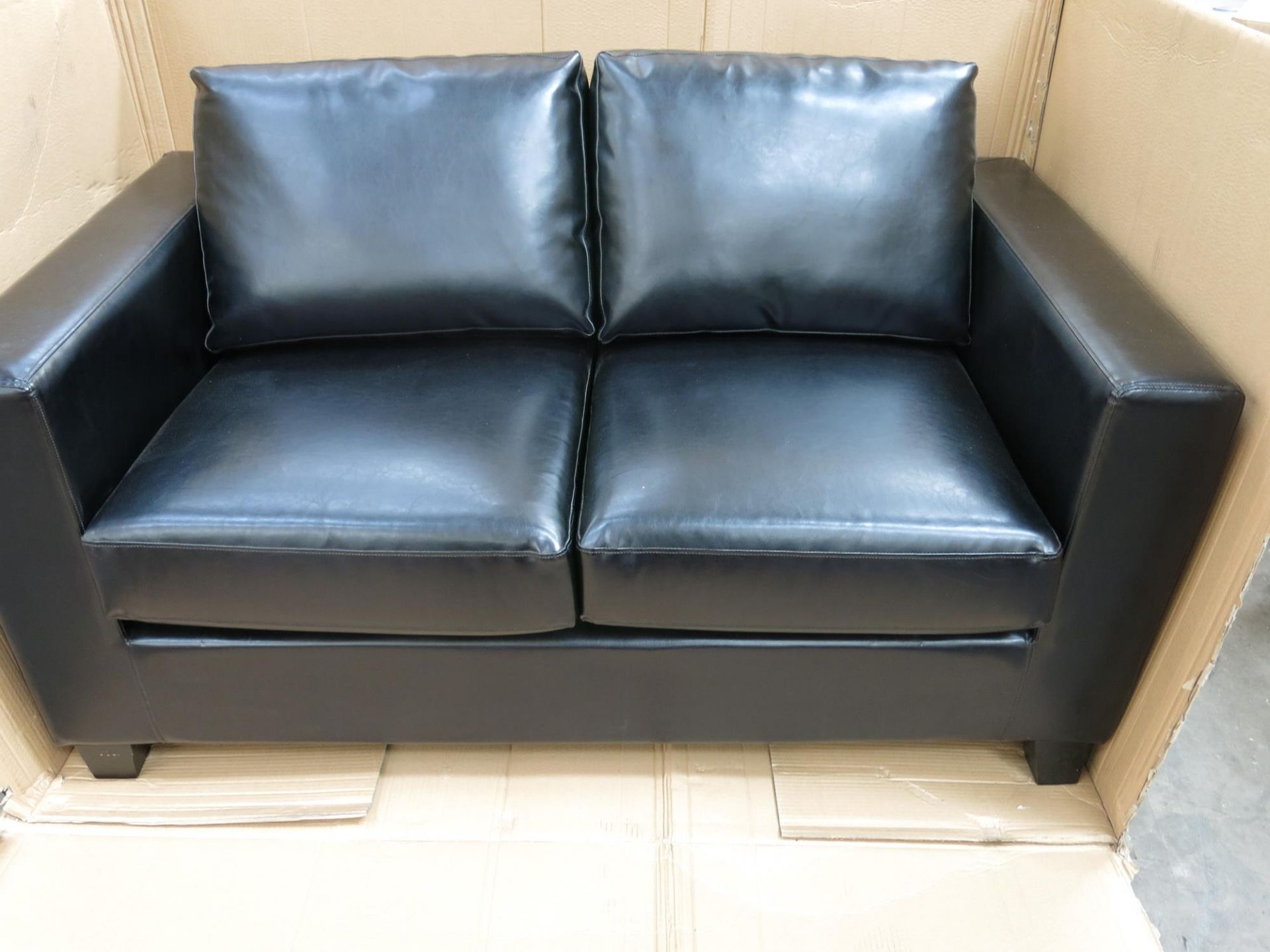 * A two seater sofa with black faux pu leather upholstery. Please note picture is for illustration