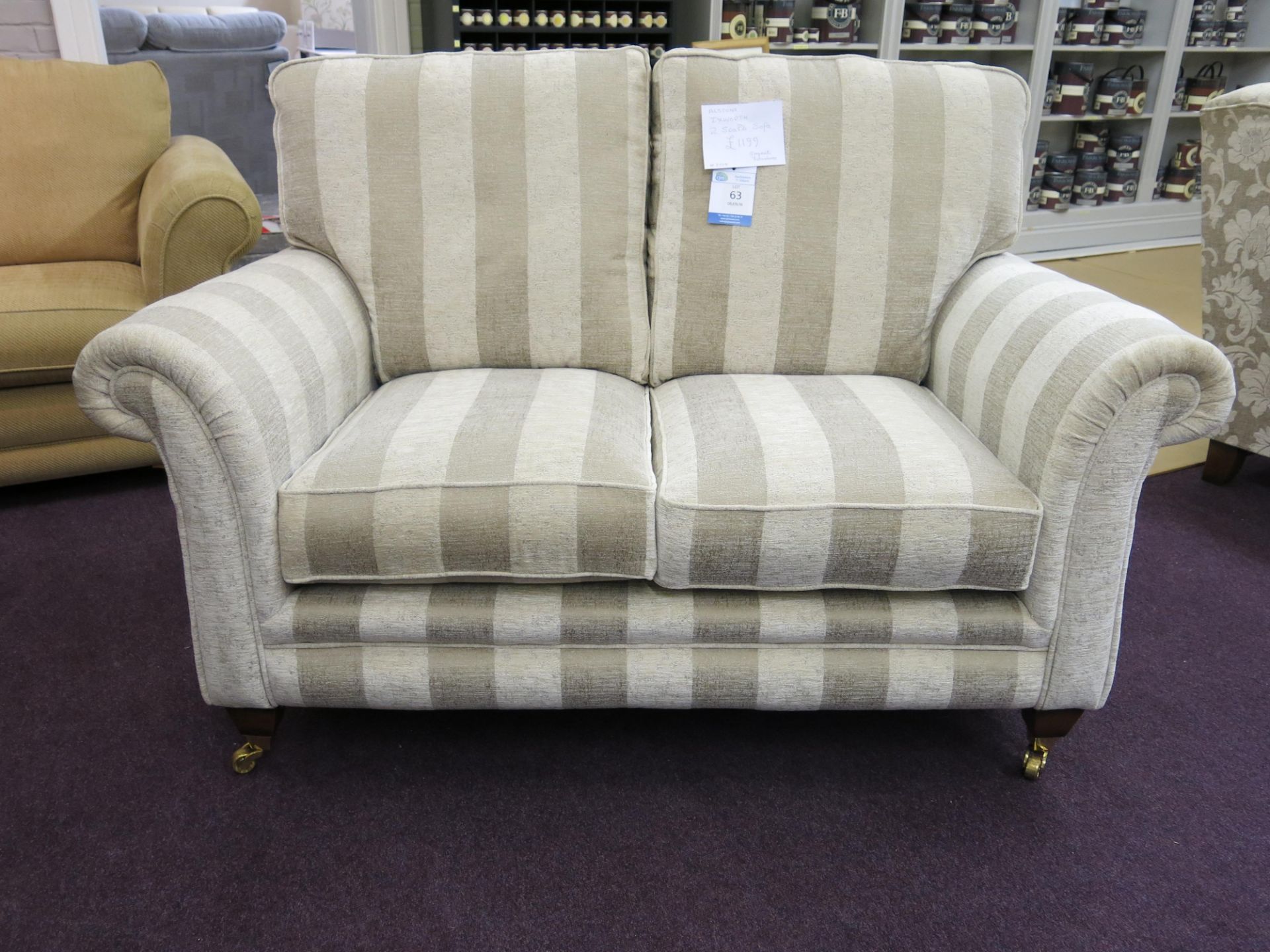 Alstons Ixworth two seat sofa with oyster stripe cover with polished brass castors on front feet. - Image 4 of 4