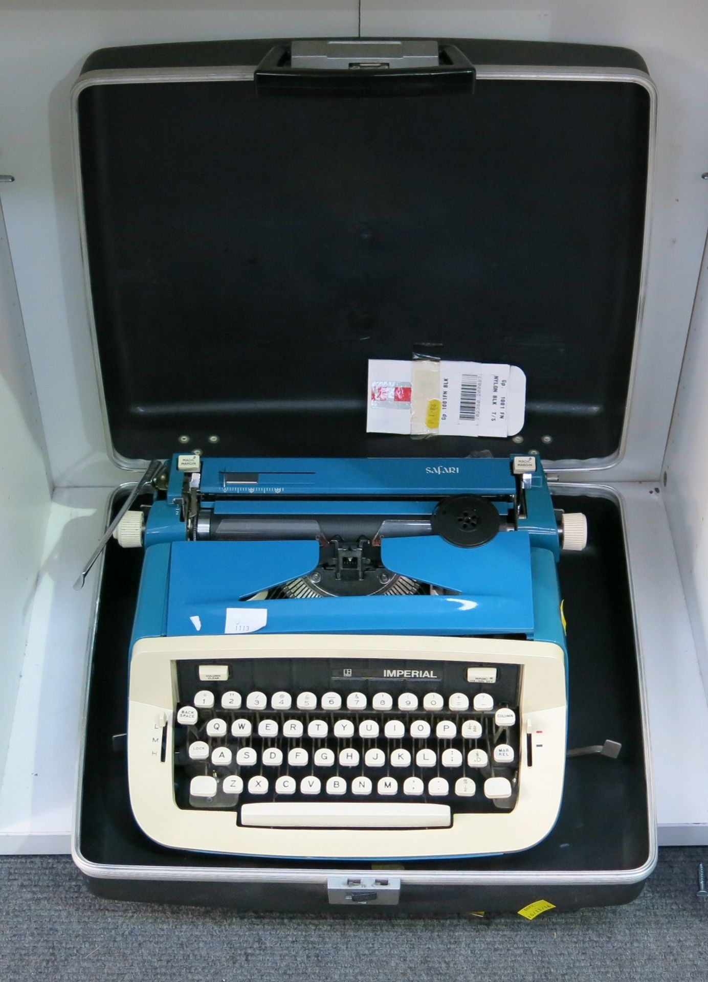 An Imperial typewriter in case (est £30-£40)