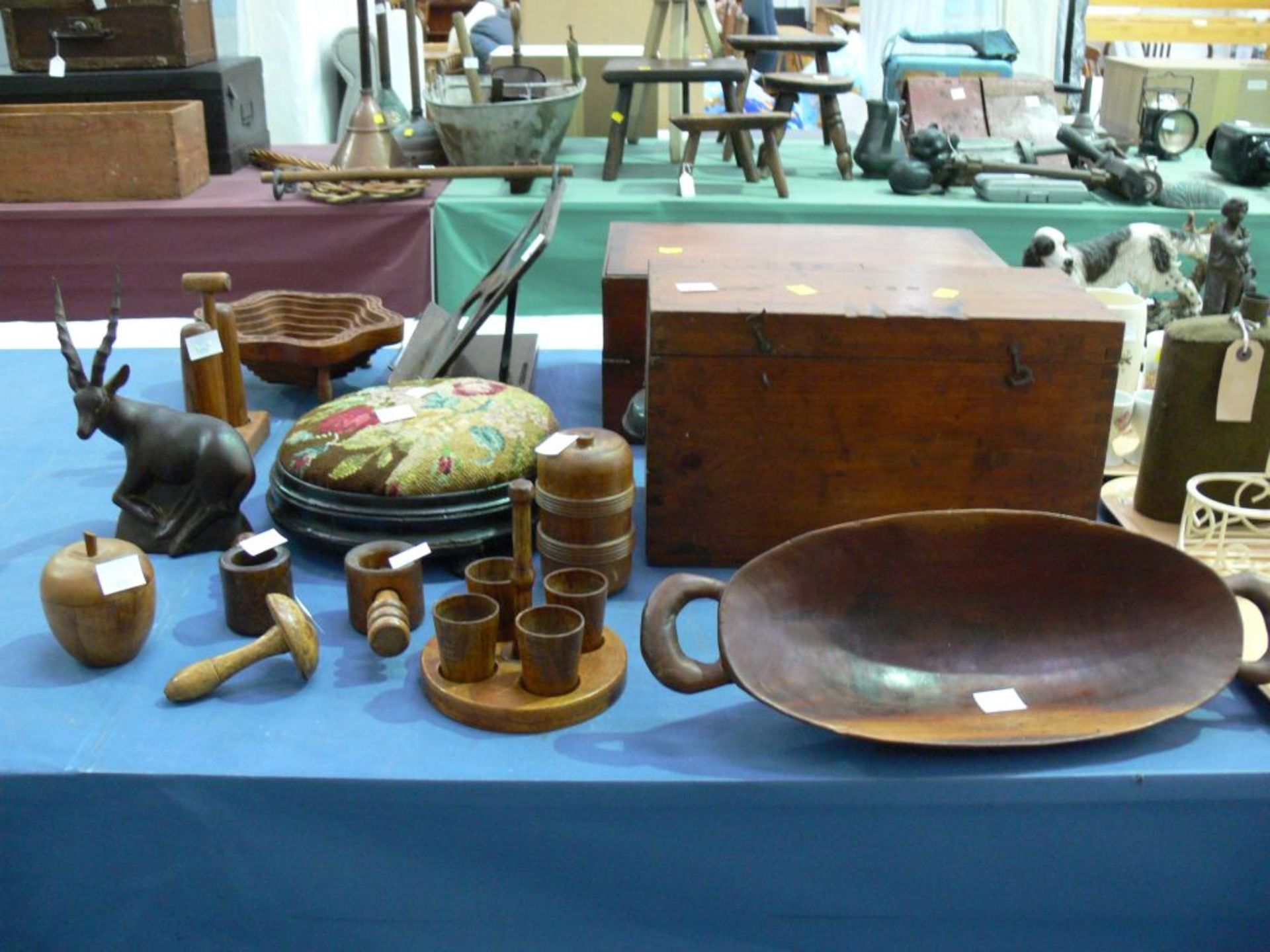 A selection of wooden items to include Turned Items, Woolwork covered Foot Stool, Nutcracker,