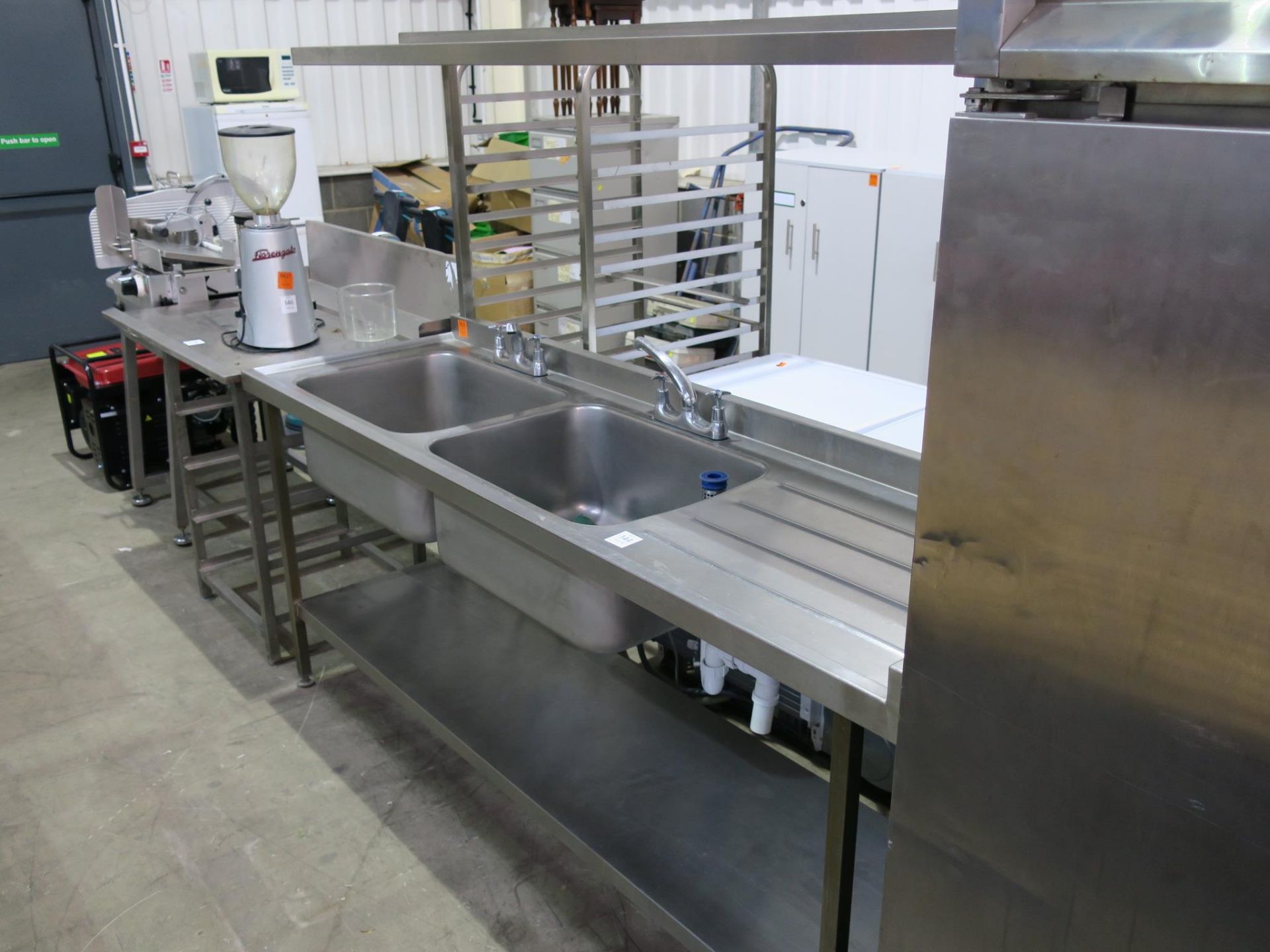 * A Stainless Steel Twin Sink Unit with shelf. Please note there is a £10 plus VAT lift out fee on
