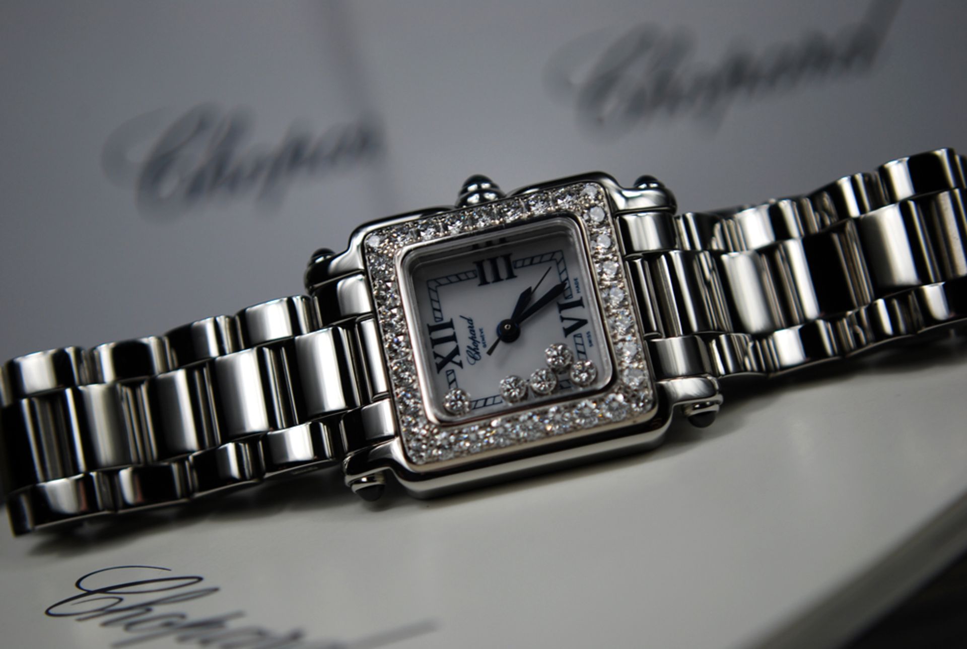 CHOPARD – FLOATING DIAMOND 'HAPPY SPORT SQUARE' with DIAMOND BEZEL!  est RRP $25,710.00 !!!