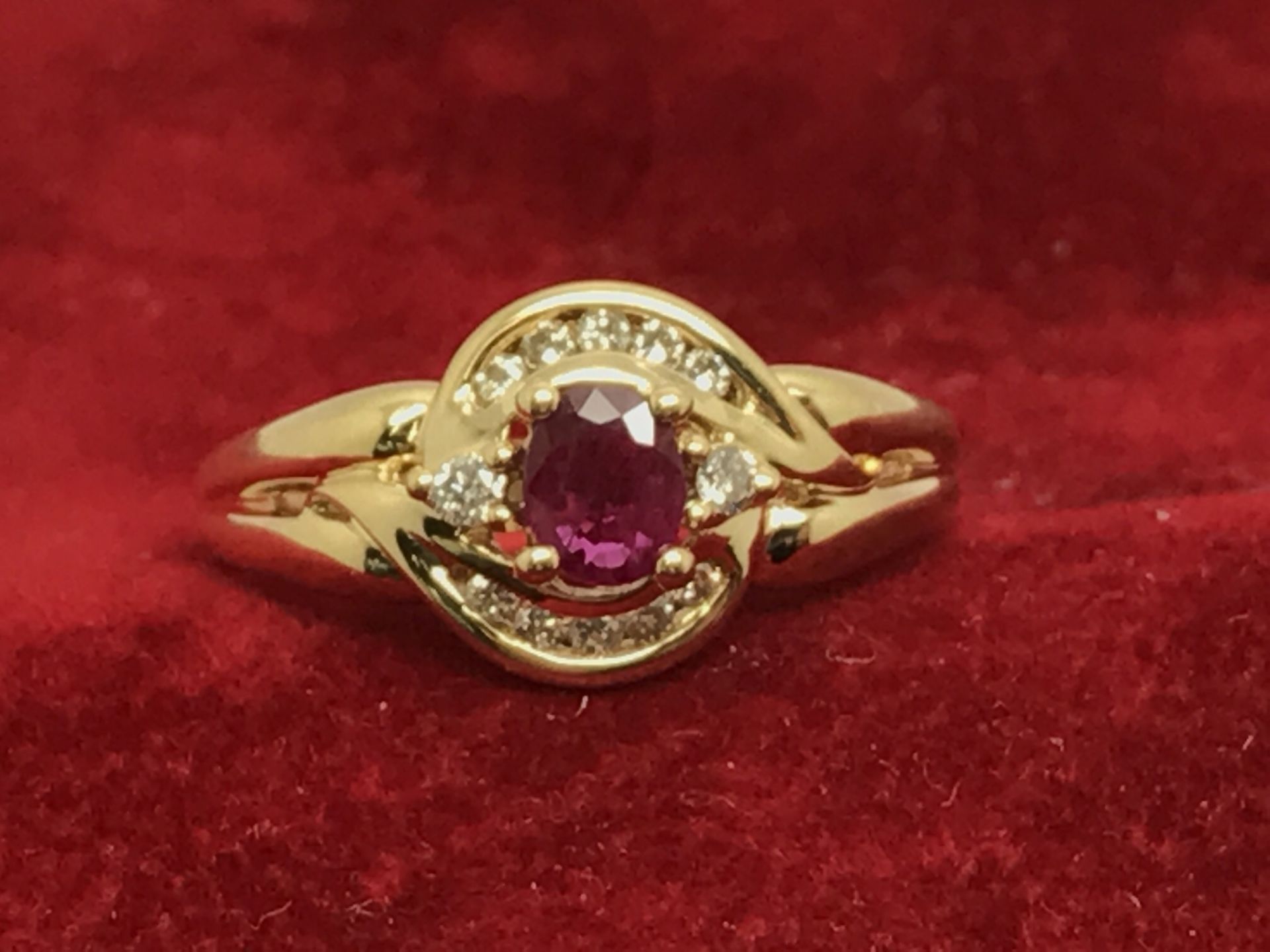 RUBY & DIAMOND RING MARKED 750 & TESTED AS 18ct GOLD