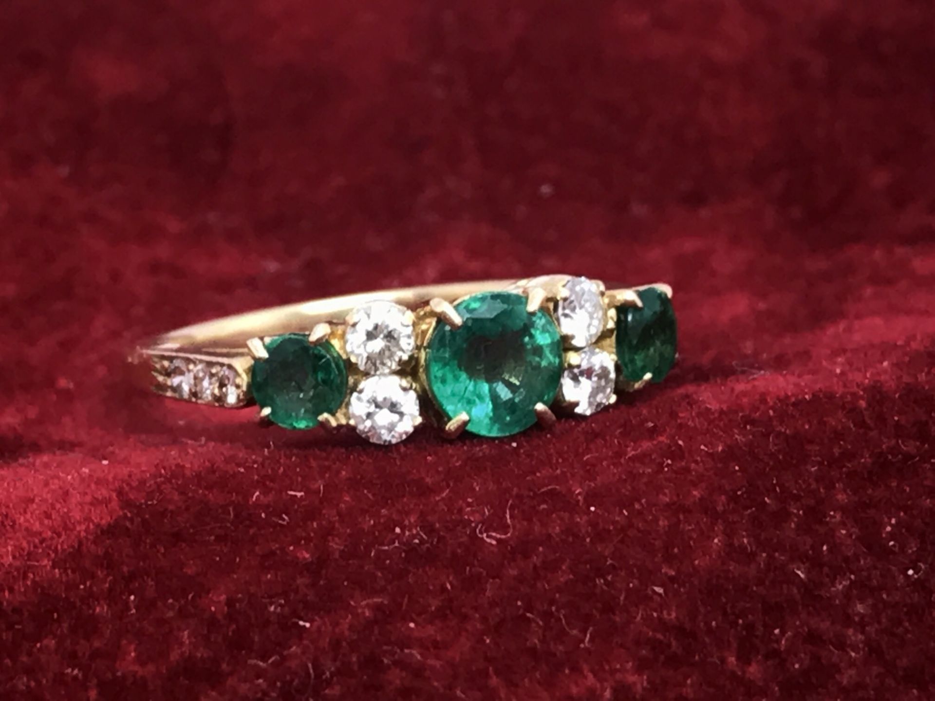 EMERALD & DIAMOND RING IN YELLOW METAL TESTED AS 18ct GOLD