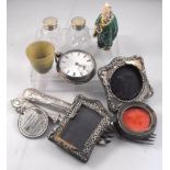 An open faced silver pocket watch, Chester 1825, silver photo frames, silver topped salts and