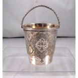 A Persian silver miniature bucket with engraved decoration 8cm high