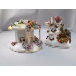 A 19thC Staffordshire spill vase 9cm tall, a bird and bird nest, and a pastille burner in the form