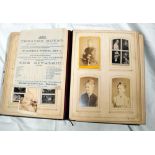 A Victorian photo album containing various photographs including Baden Powell and ladies of the