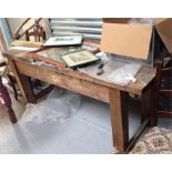 A large pine workbench with attached vice 168cm wide