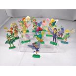 A group of fourteen painted lead figures of flower fairies, each approx. 7cm high