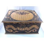 A 19thC poker work box decorated with the royal Spanish coat of arms 29cm x 23cm x 13cm