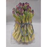 A 20thC Tromp L'oeil pottery bundle of asparagus by Lady Anne Gordon (Dowager Marchioness of