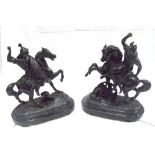 A pair of Victorian Spelter figures, warriers on horse back 37cm high Condition Report tail broken