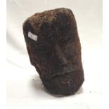 A Medieval stone head, possibly from Shaftesbury Abbey, weather worn 20cm high