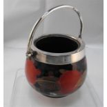 A Moorcroft pottery preserve jar, Pomegranate pattern with silver plated mount and handle, (lacks
