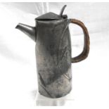 A Liberty Tudric Art Nouveau pewter coffee pot (A/F) 20cm high