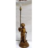 An early 20thC gilt metal figural table lamp, depicting a winged cherub 61cm high