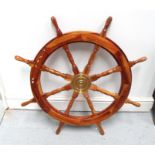 A brass mounted hardwood ships wheel 87cm diameter