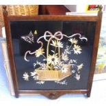 A silk work panel decorated flowers in a basket and butterflies in an oak frame 58cm x 58cm