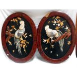 A pair of late 19thC/ early 20thC Japanese shibayama style wall plaques depicting cockerels sat on