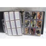 An Album of collectors cards, including Star Trek, Independence Day, X Files, Motor Vehicles and the