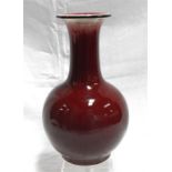A Chinese ox blood vase (drilled) 28cm high