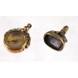 A Victorian gold plated swivel compass fob and a seal fob (2)