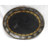 A Victorian papier mache oval tray with mother of pearl and gilded decoration 62cm x 49cm