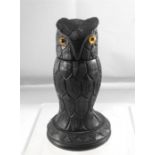A Victorian carved Irish bog oak thimble holder in the form of an owl 10cm high