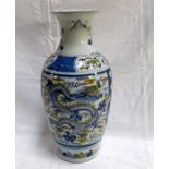 A 19thC Chinese vase, decorated dragons and flowers (restored) 43cm high