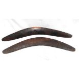 An Australian Aboriginal boomerang 16cm wide and another similar decorated with Emus and a