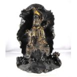 A gilt bronze figure, seated in meditation 17cm high