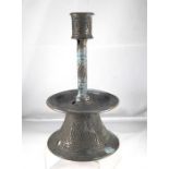 A Persian bronze candlestick (drilled) 21.5cm high