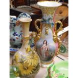 A Doulton Lambeth vase, decorated flowers 38cm high and a continental two handled vase decorated a