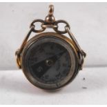 A Victorian gold plated compass fob with mother of pearl dial 2cm diameter