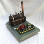 A Vintage German tin plate steam engine and boiler 26cm x 34cm