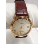 An 18ct Tissot gentleman's automatic wrist watch with Roman numerals and date aperture No.