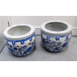 A pair of modern Chinese blue and white planters 38cm diameter