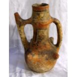 An early pottery spouted vessel, possibly Berber 26cm high