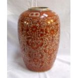 A Chinese red and white vase decorated flowers on a crackle glaze ground "restored" 34cm high