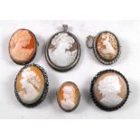 A group of six cameo brooches with silver and metal mounts