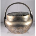A 19thC Chinese Paktong hand warmer with pierced lid and finely engraved with insects and flowers