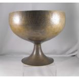 A 12thC Persian Khorassan bronze footed bowl, engraved to the rim with Kufic script in repetition of