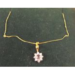 A 9ct gold sapphire pendant and chain