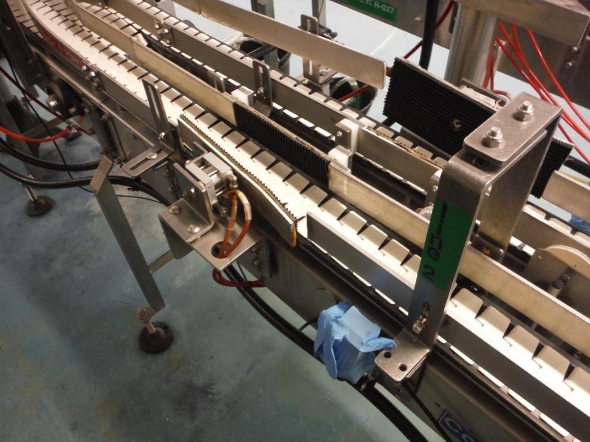 Fleetwood 180 degree table top conveyor, SS bed, plastic table top belt, approximately 32 ft. of bel - Image 7 of 9